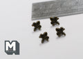 1:12 scale miniature antique brass fleur de lis cabinet knobs, set of 4, shown on a white surface with a ruler