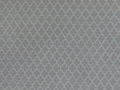1:12 scale miniature gray trellis pattern wallpaper sheet, close view of the repeating lattice design