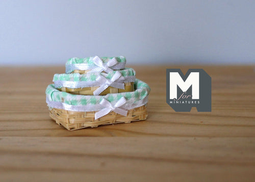 1:12 scale miniature bamboo bread baskets with mint green gingham lining and white bows, set of 3, shown nested