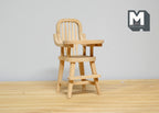 1:12 scale miniature unpainted wood high chair with tray and spindle back, shown on a wood floor against a white wall