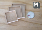 1:12 scale miniature unpainted wood square nesting trays, set of 3, shown on a wood surface beside a coin for scale