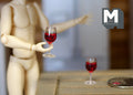 1:12 scale miniature red wine glasses, set of 2, tall stemmed glasses, shown with a jointed figure and a coin