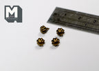 1:12 scale miniature antique brass fluted cabinet knobs, set of 4, shown with a ruler for scale