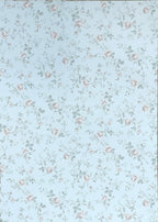 1:12 scale miniature floral peel and stick wallpaper in light blue with small pink roses and green leaves