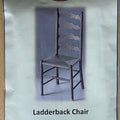 1:12 scale miniature ladderback chair kit, dark chair with four shaped back slats and woven seat shown on the package