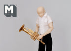 1:12 scale miniature brass trumpet with storage case, gold finish, shown held by a poseable figure