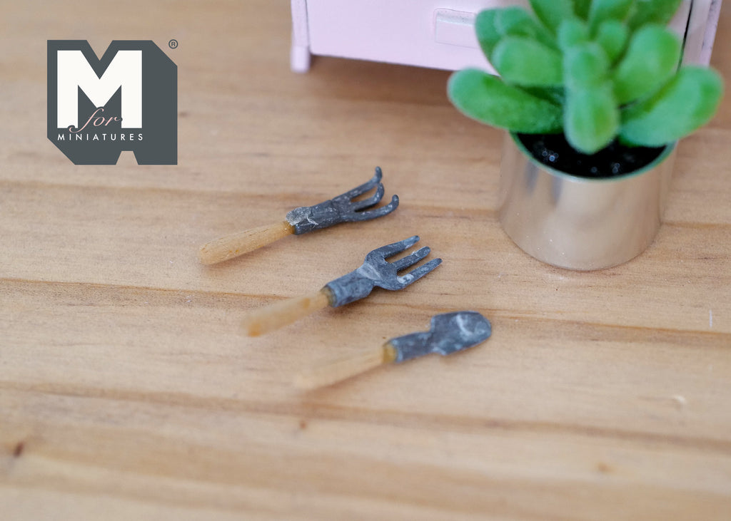 1:12 scale miniature garden hand tools, trowel, fork and rake, set of 3, wood handles, shown beside a potted succulent