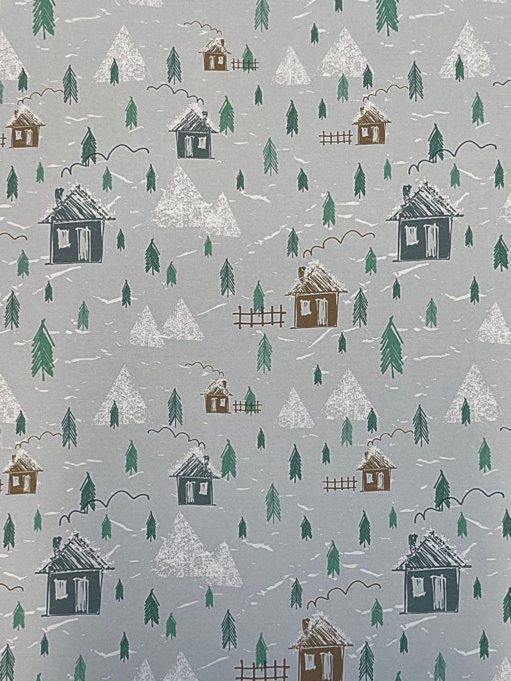1:12 scale miniature winter village peel and stick wallpaper with houses and pine trees in green and gray tones