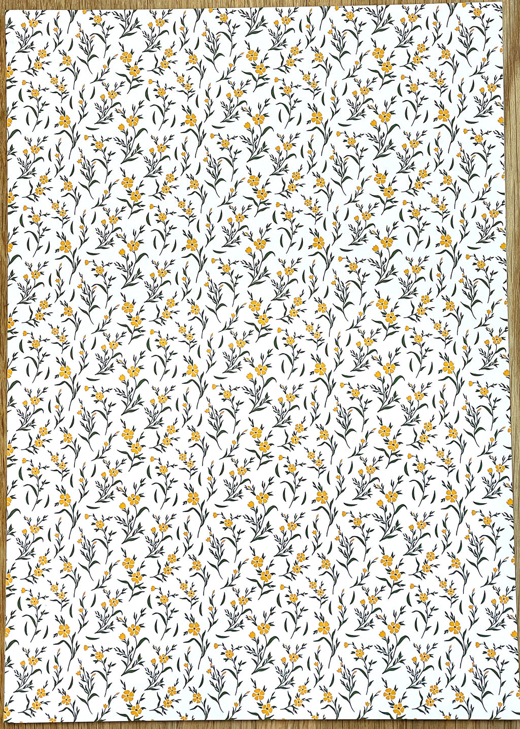 1:12 scale miniature botanical sprig peel and stick wallpaper in white with yellow blooms and gray leaves, full sheet