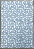 1:12 scale miniature blue floral peel and stick wallpaper, white flowers and leaves on a dusty blue background