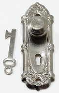 1:12 scale miniature gunmetal door knob with scroll backplate and key, from a set of 2, on a white background