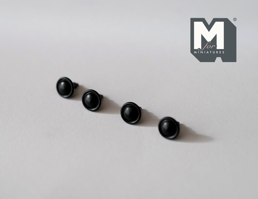 1:12 scale miniature rimmed dome knobs in matte black, set of 4, round cabinet knobs lined up on a white surface