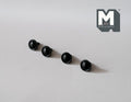 1:12 scale miniature rimmed dome knobs in matte black, set of 4, round cabinet knobs lined up on a white surface
