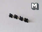 1:12 scale miniature matte black fleur de lis cabinet knobs, set of 4, lined up on a white surface