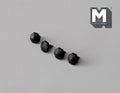 1:12 scale miniature octagon pyramid knobs in matte black, set of 4, shown in a row on a gray surface