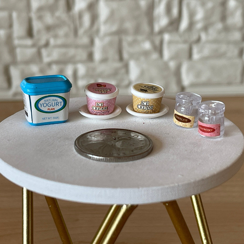 1:12 scale miniature assorted ice cream and plates, set of 7, tubs and cups with printed labels, beside a coin
