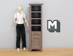 1:12 scale miniature brown wood bathroom cabinet with open shelves and lower door, shown beside a figure for scale