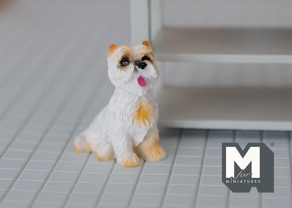 1:12 scale miniature sitting terrier dog in white and tan cast resin with tongue out, shown on a tiled floor