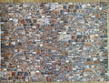 Miniature multicolor embossed stone wall sheet, irregular brown, gray and tan stones in a rustic wall pattern