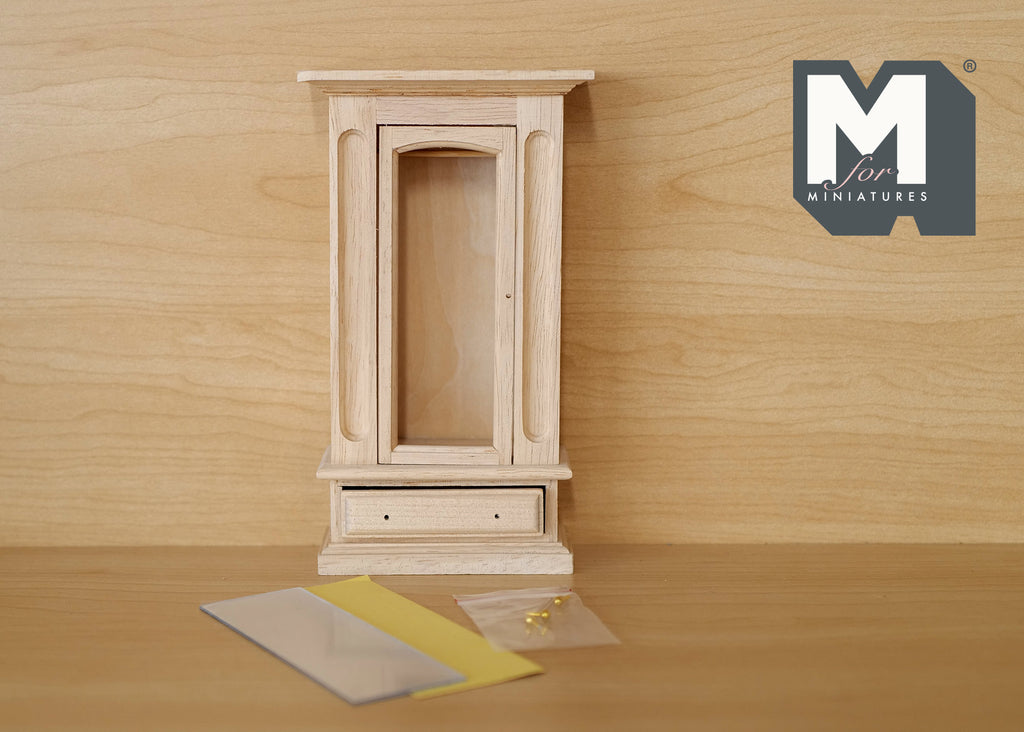1:12 scale miniature unpainted wood cabinet with mirror door and drawers, shown with separate mirror sheet