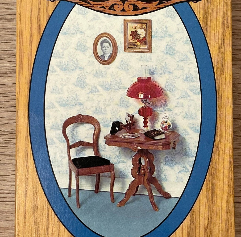 1:12 scale miniature Victorian table, chair and accessories kit, 5 pieces, shown as the box art of a parlor corner