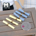 1:12 scale miniature rolled table napkins with napkin rings, set of 6, blue and yellow, shown beside a coin