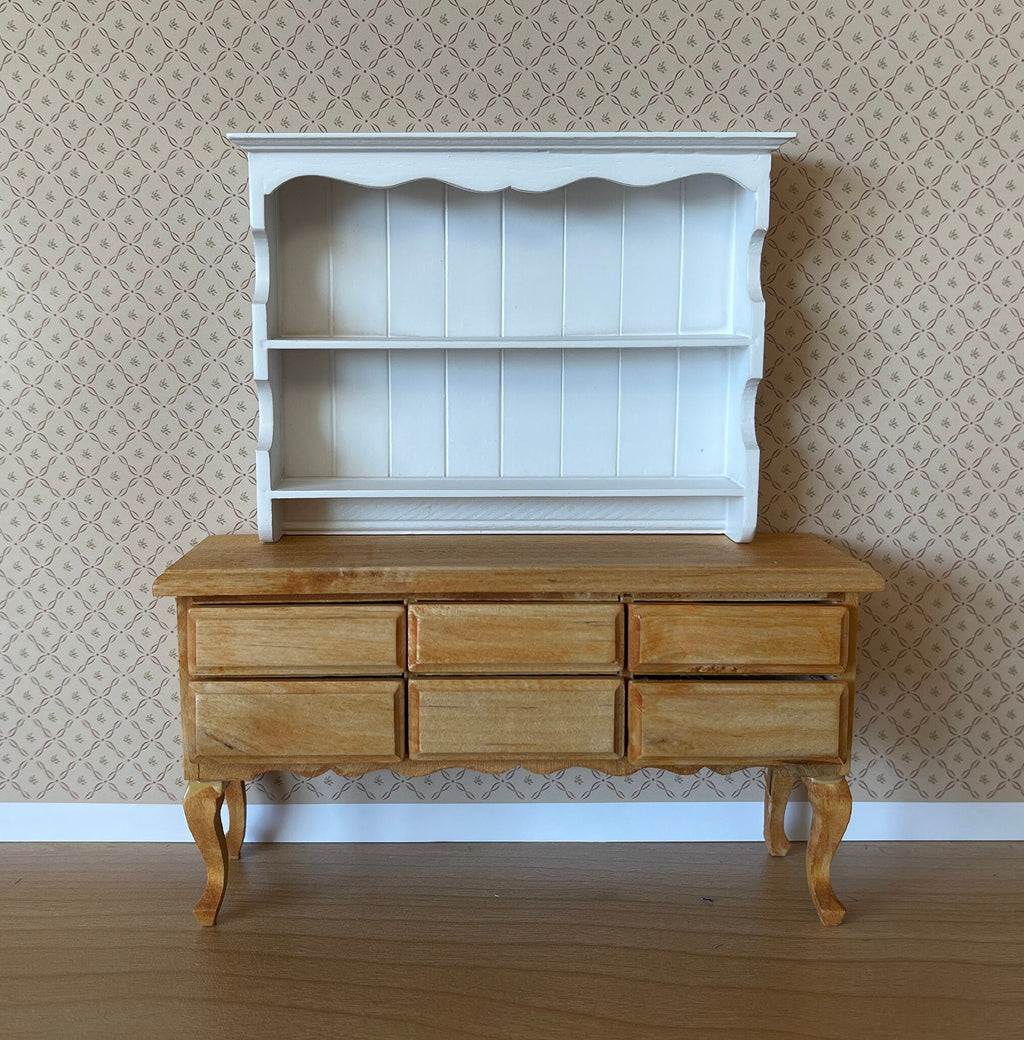 1:12 scale miniature wood wall shelf in white with 2 shelves and scalloped top, shown on a wood sideboard