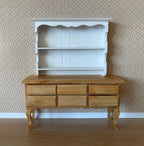 1:12 scale miniature wood wall shelf in white with 2 shelves and scalloped top, shown on a wood sideboard