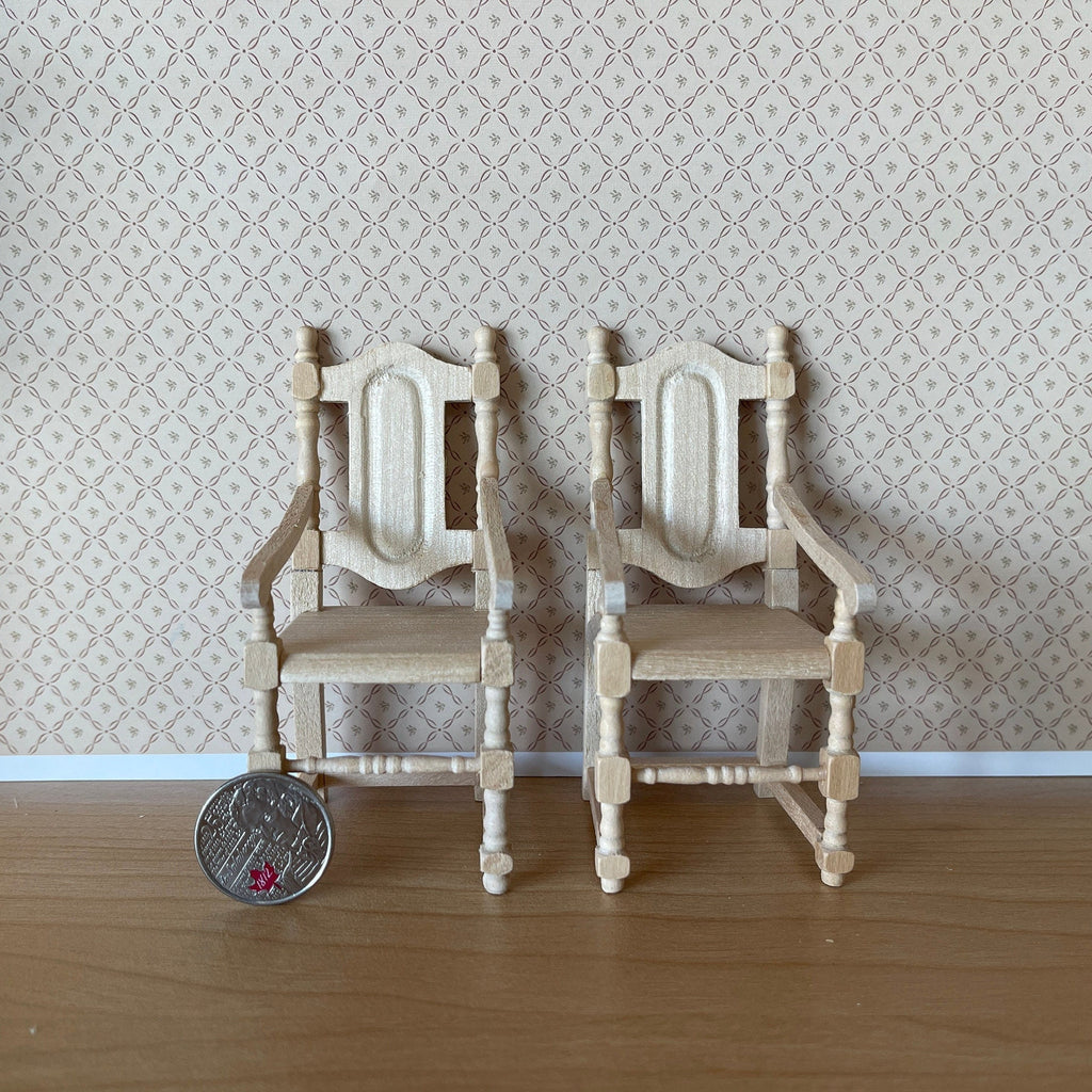 1:12 scale miniature unpainted wood dining armchairs with carved backs, set of 2, shown side by side with a coin