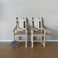 1:12 scale miniature unpainted wood dining armchairs with carved backs, set of 2, shown side by side with a coin