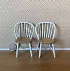 1:12 scale miniature wood Windsor spindle back dining chairs in white with tan seats, set of 2, shown with a coin