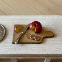 Miniature Sliced Round Cheese Crackers and Knife on Cutting Board 1:12 Scale Dollhouse Food Decoration. (fixed to the board) - E028