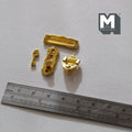 1:12 scale miniature brass door knob, knocker, door plate and key, set of 4, gold tone pieces shown above a ruler