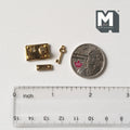1:12 scale miniature brass rim lock with key and strike plate, 3 piece set, shown with a coin and a ruler for scale