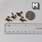 1:12 scale miniature metal hat and coat hooks in copper, set of 4 double hooks, shown with a coin and a ruler