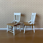 1:12 scale miniature wood spindle back dining chairs in white with brown seats, set of 2, shown on a wood floor