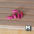 1:12 scale miniature sweet potatoes, set of 5, purple pink skins with dark specks, shown on a wood table