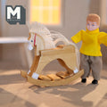 1:12 scale miniature large wood rocking horse in cream with a white string mane, shown beside a boy doll in a yellow sweater