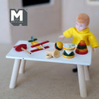 1:12 scale miniature wood toy set with plane, drum and ring stacker, set of 6, shown on a white table with a boy doll