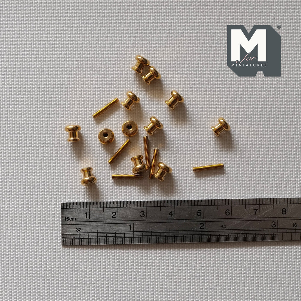 1:12 scale miniature brass barrel cabinet knobs with screws, set of 12, gold tone, shown with a ruler for scale