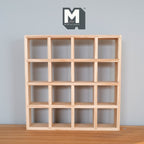 1:12 scale miniature unpainted wood cube shelf unit with 16 cubes, square open grid, shown on a wood floor