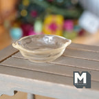 1:12 scale miniature large salad bowl with handles in clear, single bowl, shown on a wood table