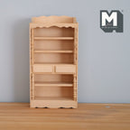 1:12 scale miniature unpainted wood kitchen shelf with 5 tiers, 2 drawers and scalloped top, against a gray wall