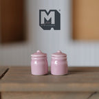 1:12 scale miniature pink ceramic jars with lids, set of 2, glossy canisters shown on a wood surface
