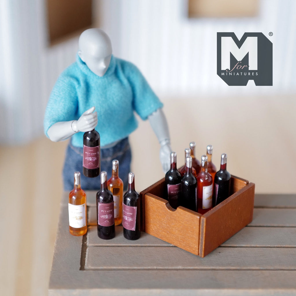 1:12 scale miniature brown wood wine crate with 12 assorted wine bottles, red and rose, shown with a poseable figure
