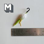 1:12 scale miniature lace parasol with green trim, gold tassels and black hook handle, shown with a ruler