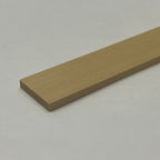 Miniature flat wood strips for trim and shelving, set of 2, close-up of one smooth tan strip end