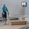 1:12 scale miniature unpainted wood 3 tier display shelf, long stepped fruit stand, shown beside a poseable figure
