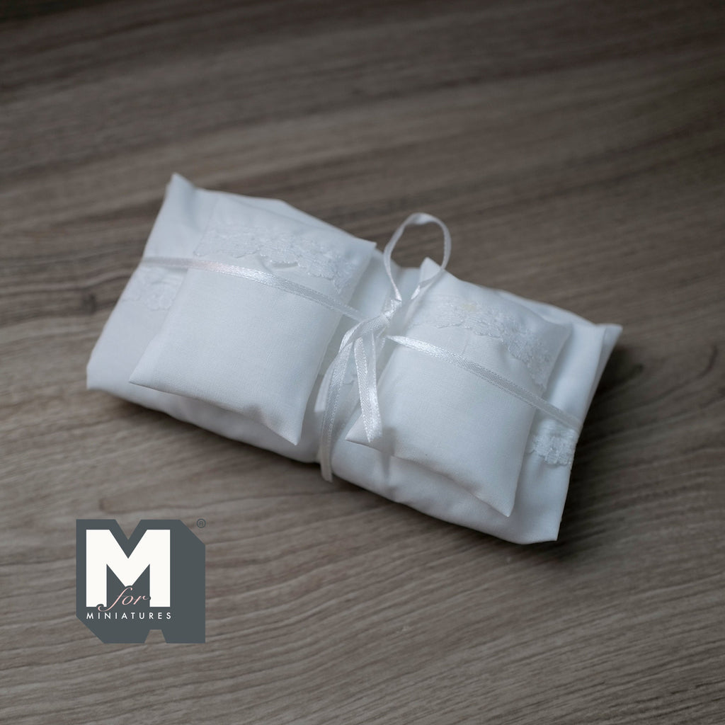 1:12 scale miniature queen bedding set in white, 4 pieces with 2 pillows, comforter and sheet, tied with a ribbon