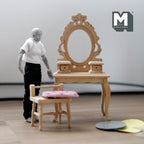 1:12 scale miniature unpainted wood dressing table with oval mirror and chair, carved frame, shown with a figure for scale